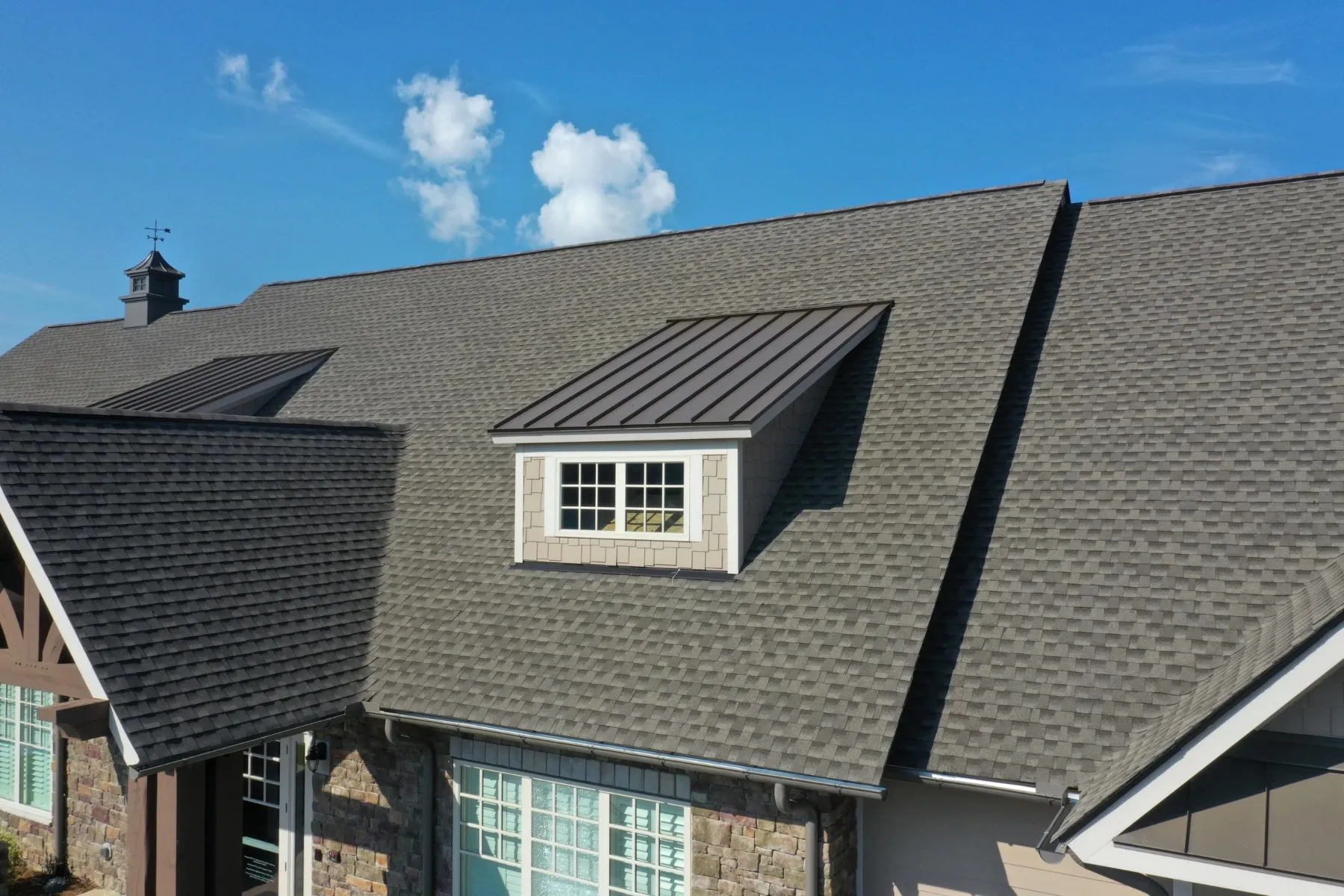 New asphalt shingle roof installation on a home in Castle Rock, Washington by Summit Exteriors roofing contractors.